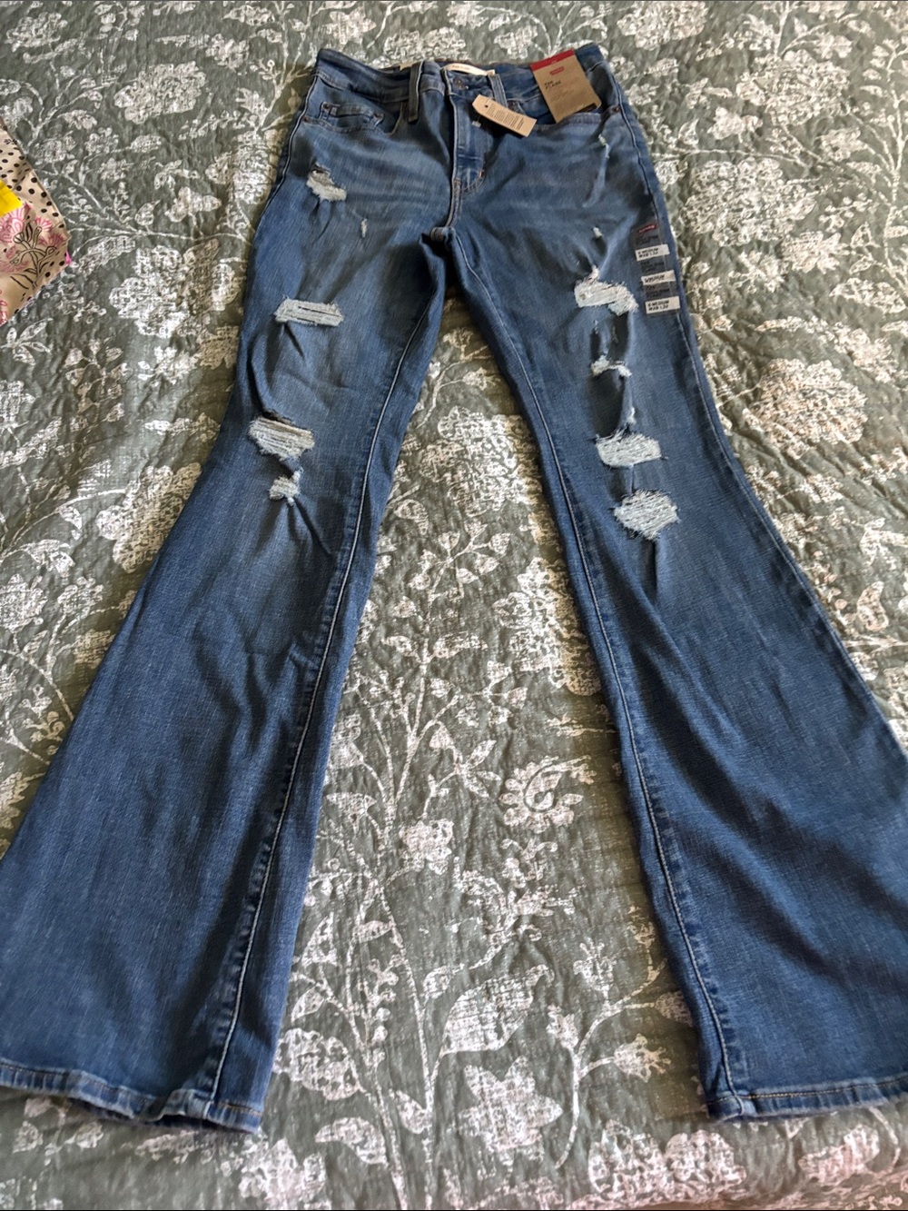 Levi's Women's Distressed Dark Blue Flare Jeans